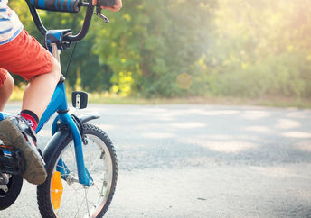 Boy on bike.