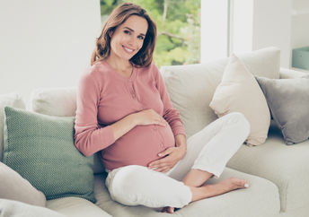 A pregnant woman.