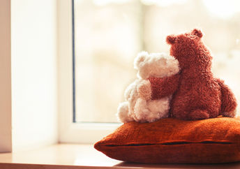 Two teddy bears.