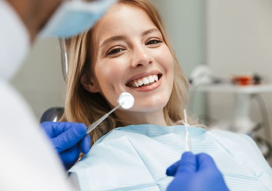 Woman who is no longer experiencing sensitive teeth.