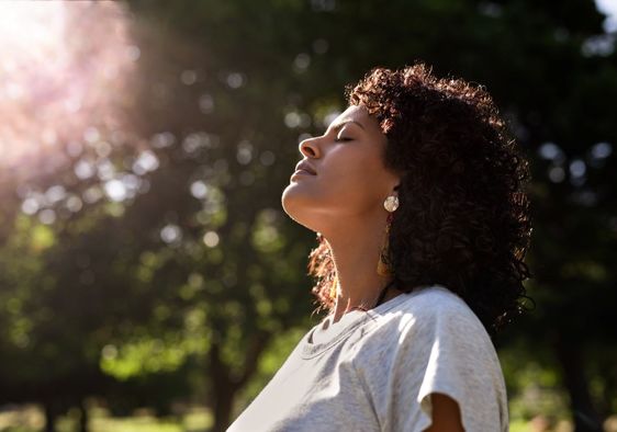 Woman doing a mindful reset.