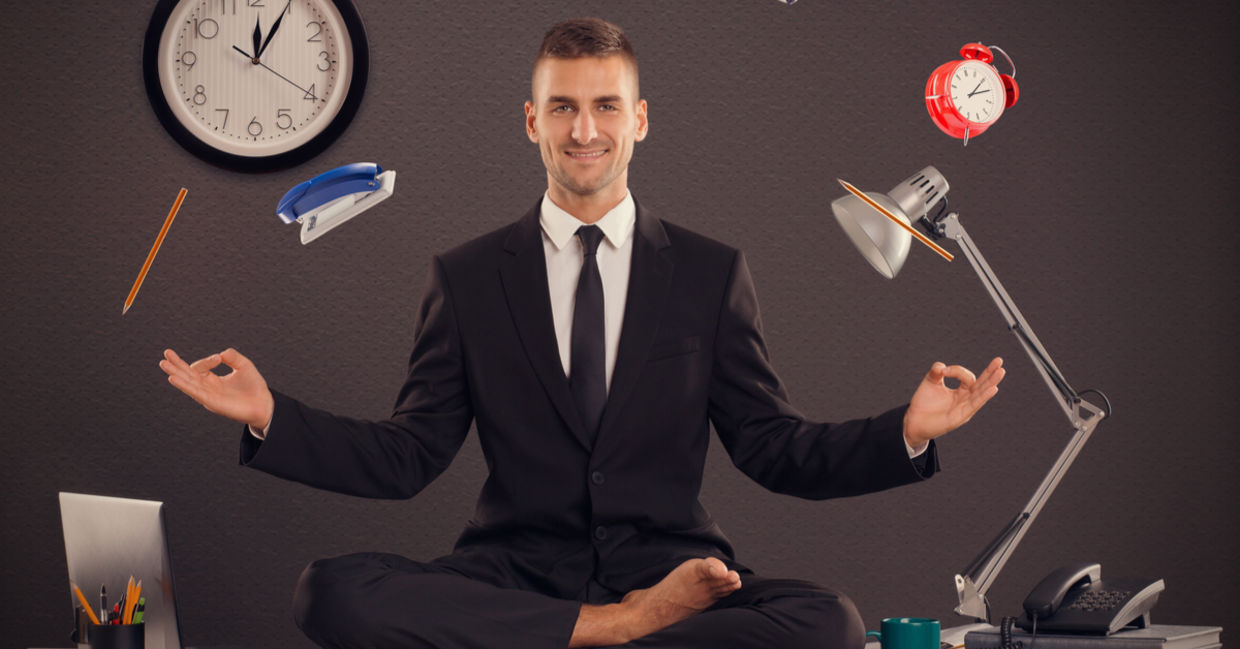 Businessman meditating desk office mindfulness Businessman meditating desk office mindfulness