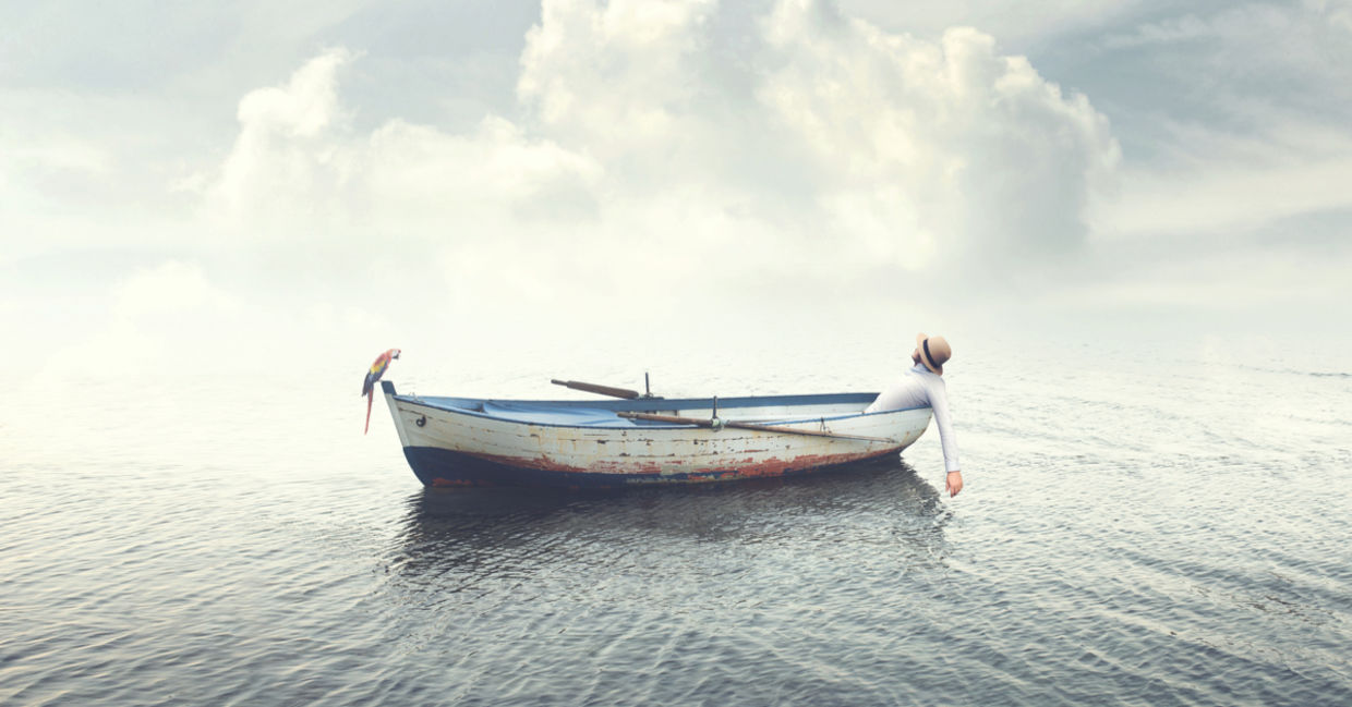 Man on a boat in the sea.