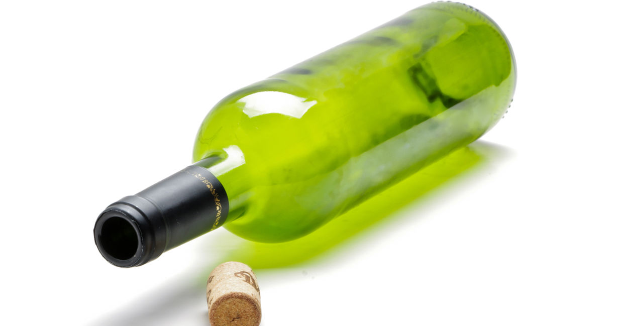 Empty wine bottles to be repurposed.