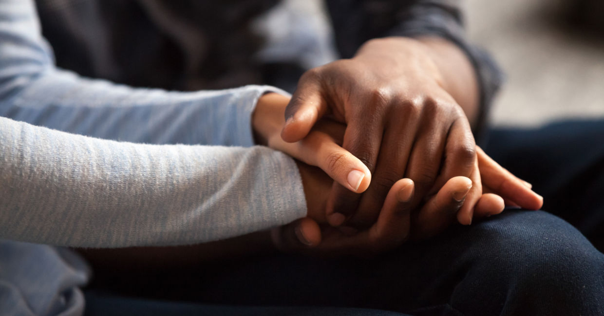 Holding hands kindness compassion