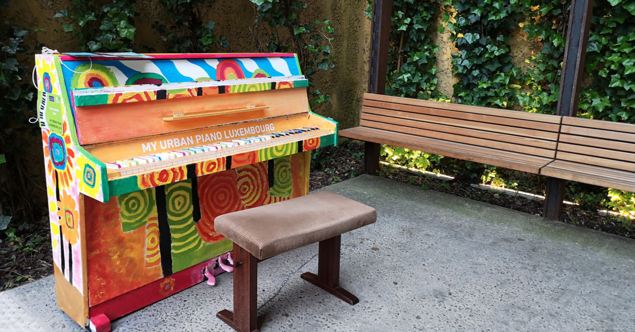 A piano in a park. A piano in a park.