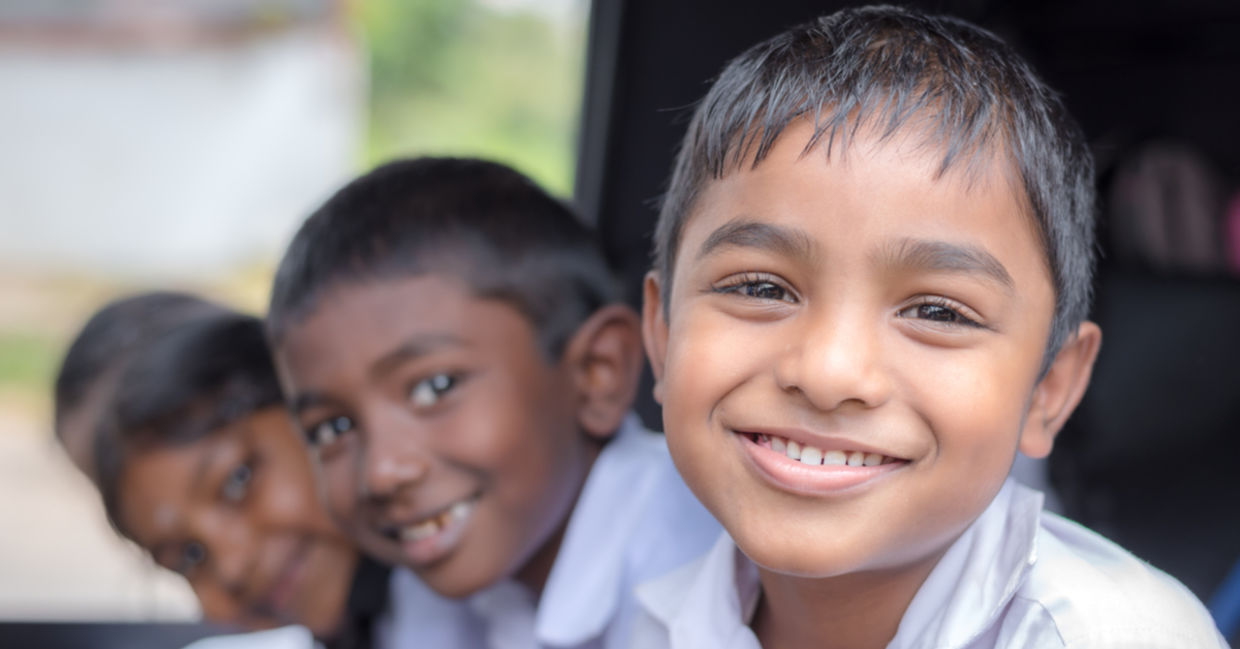 Happy, healthy Indian children smiling as they go to school. Happy, healthy Indian children smiling as they go to school.