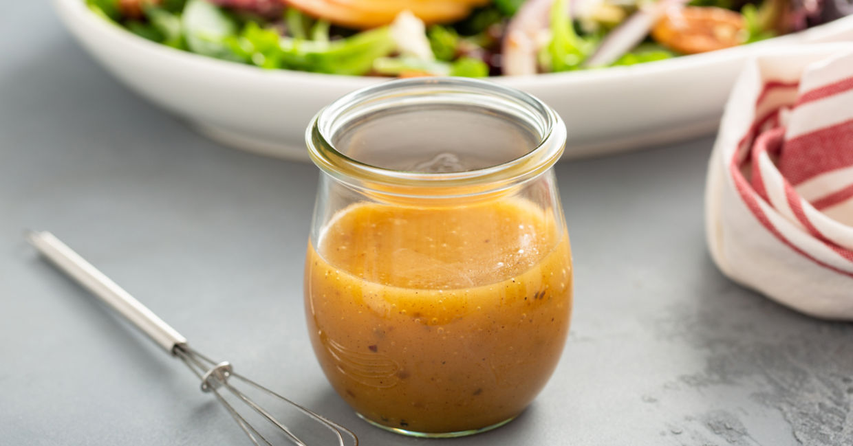 Apple vinaigrette dressing in a mason jar. Apple vinaigrette dressing in a mason jar.