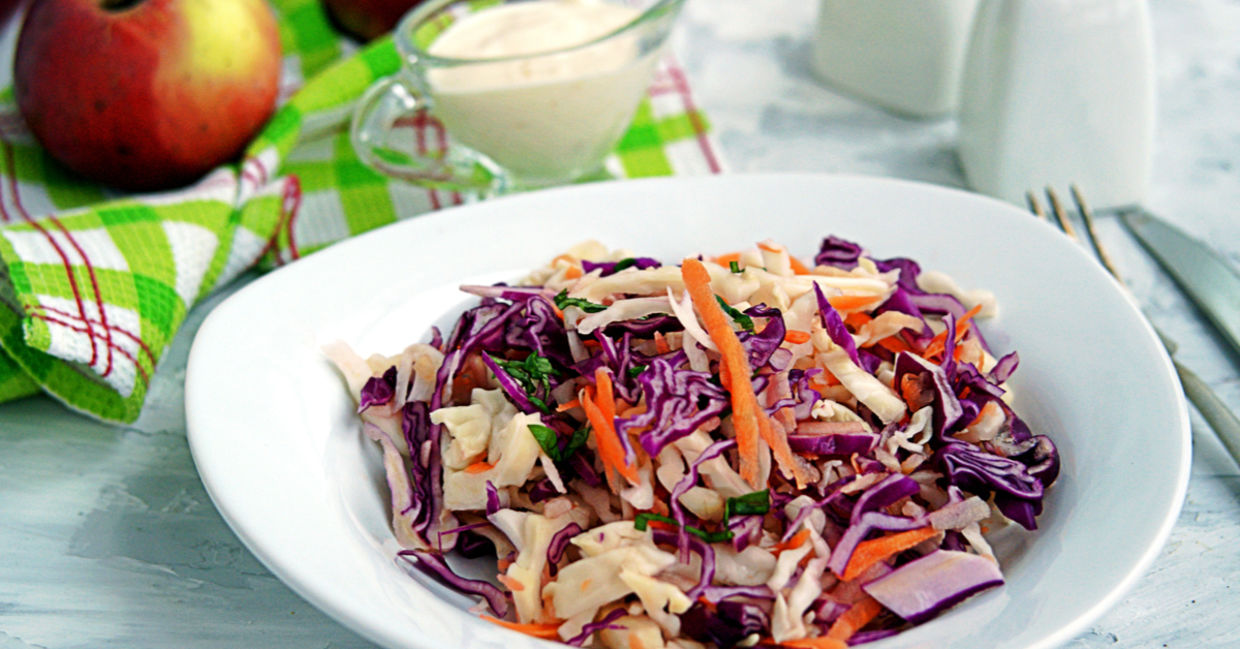 A bowl of crunchy apple slaw. A bowl of crunchy apple slaw.