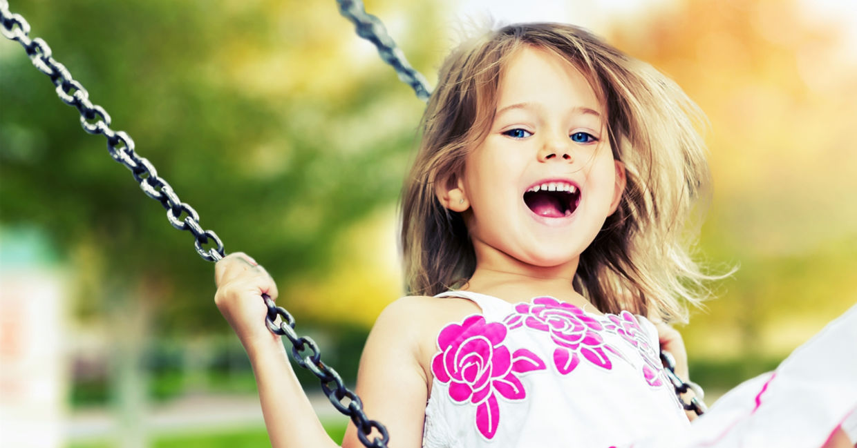 Child swinging.