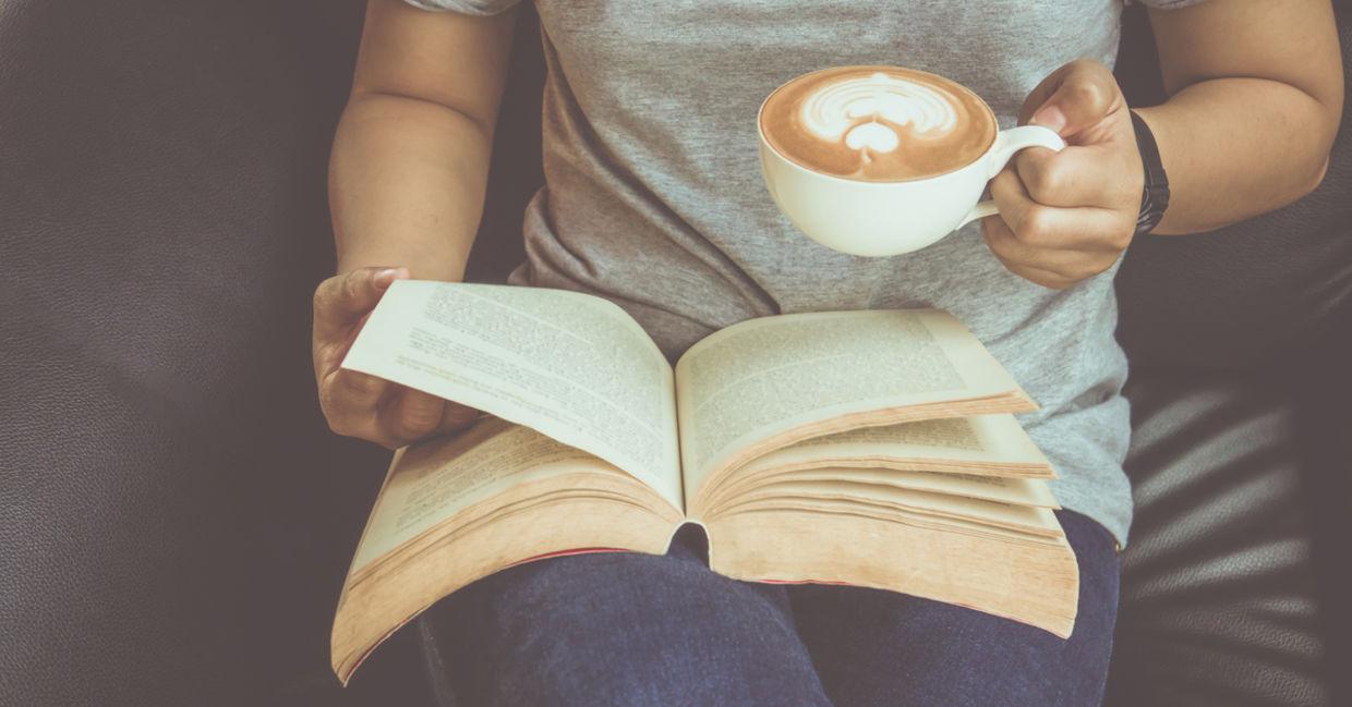Reading a book.
