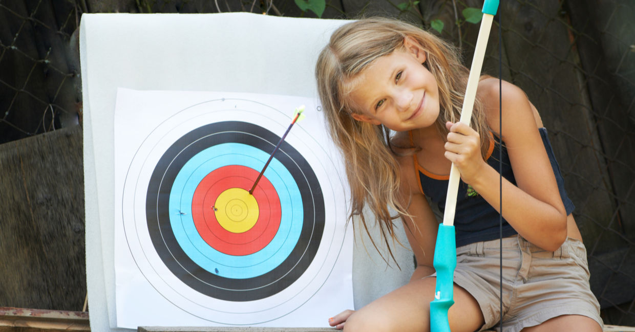 Children improve hand eye-eye coordination by doing archery. Children improve hand eye-eye coordination by doing archery.