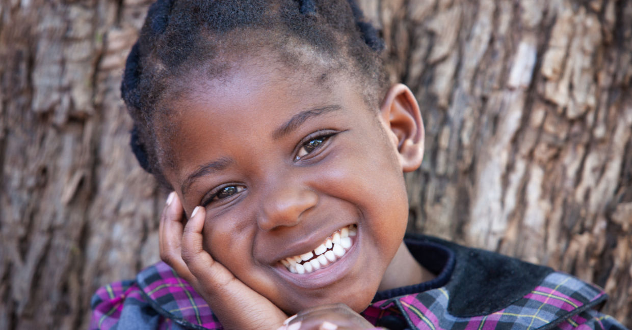 A smiling girl. A smiling girl.