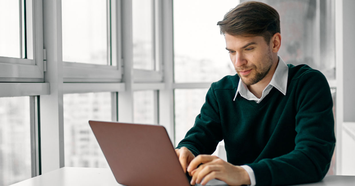 Using a laptop. Using a laptop.