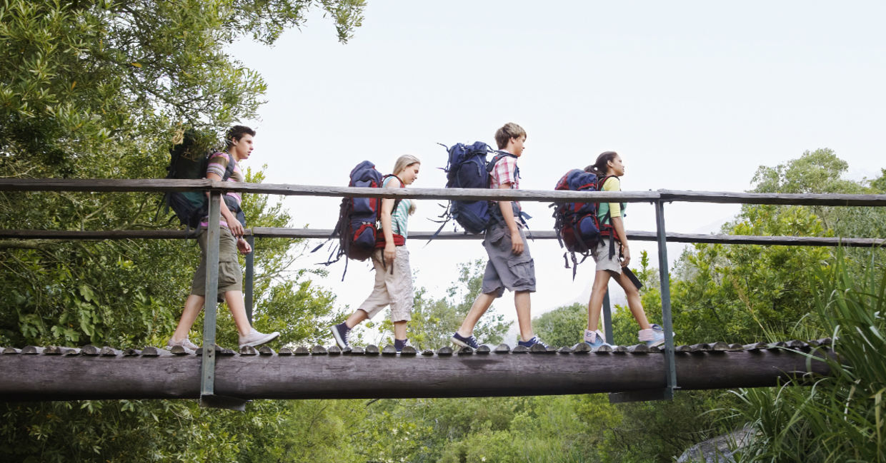 Teenagers walking on the bridge. Teenagers walking on the bridge.