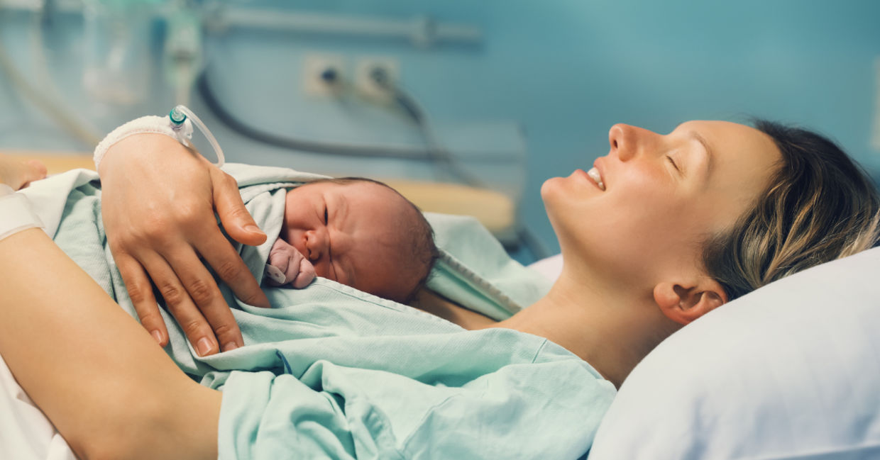 Newborn baby with mother
