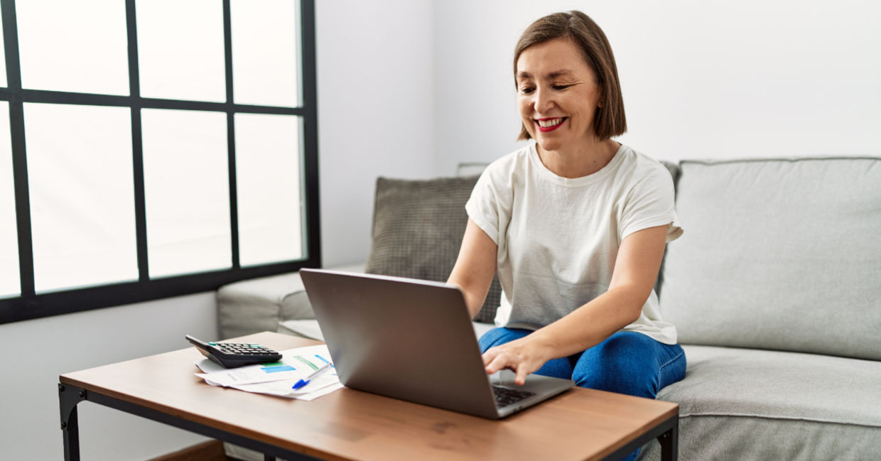Using a laptop.