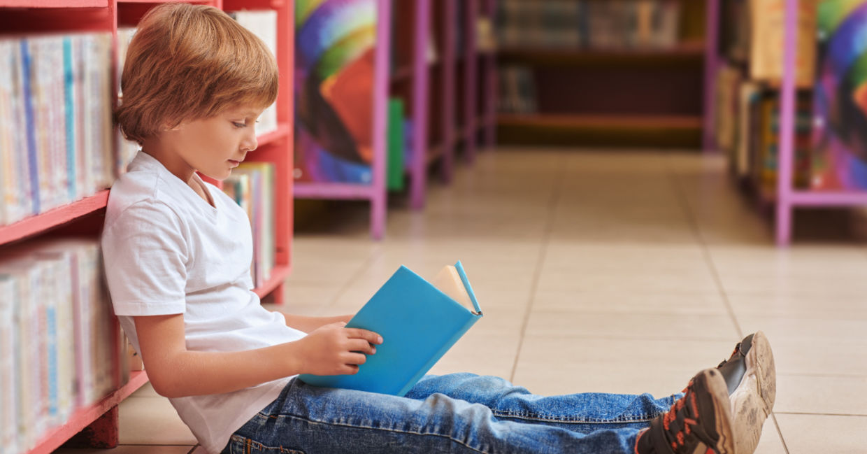 Cute boy with a book. Cute boy with a book.