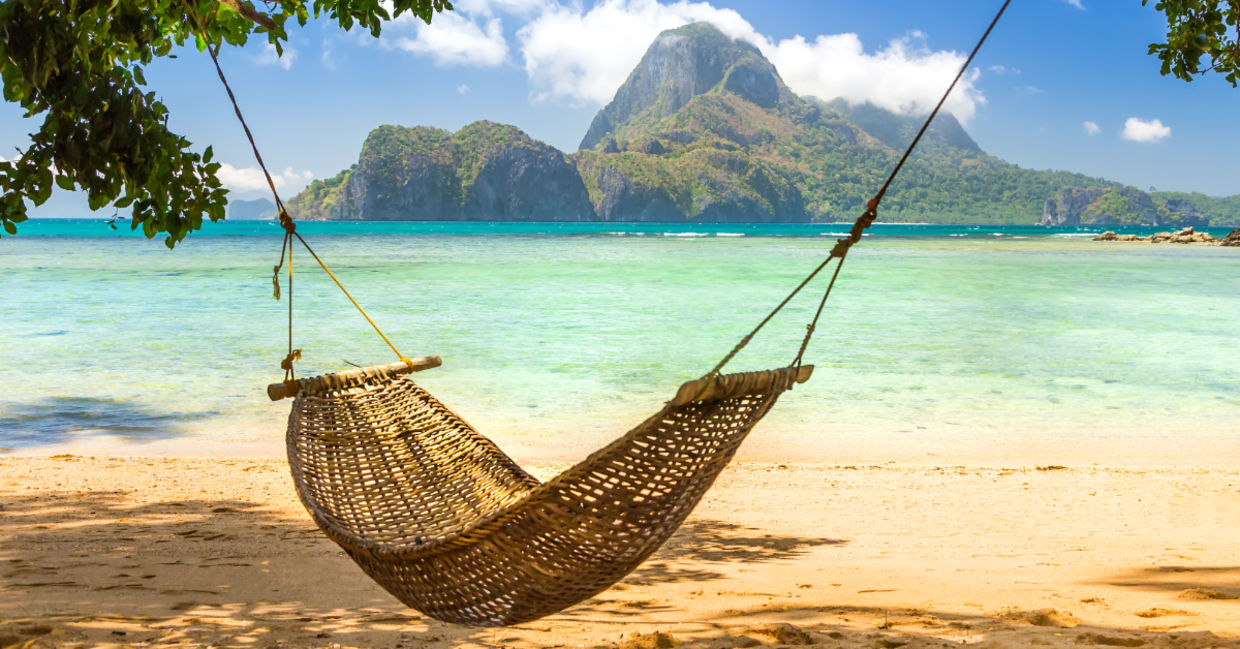 A hammock on a tropical island. A hammock on a tropical island.