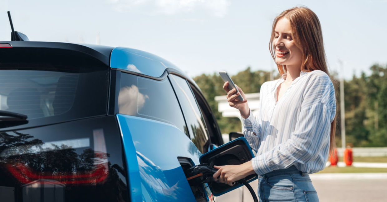 Charging an electric car. Charging an electric car.
