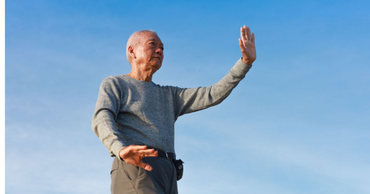 Practicing qigong by the sea. Practicing qigong by the sea.