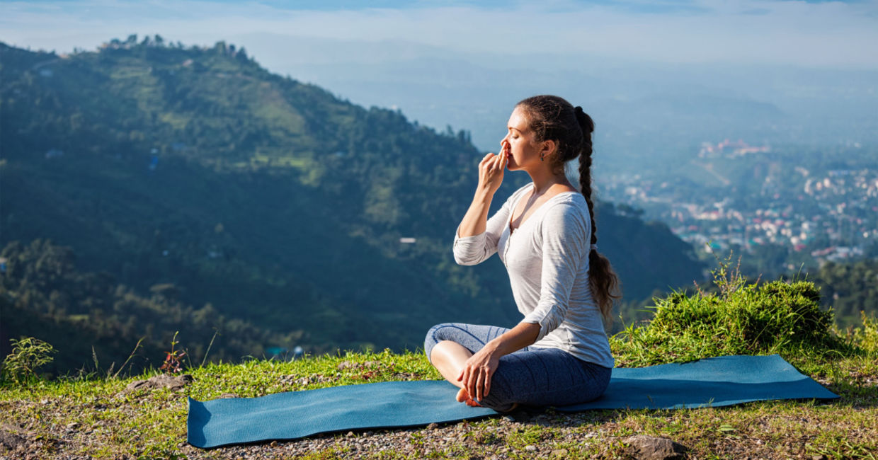 Woman practicing breathe control. Woman practicing breathe control.