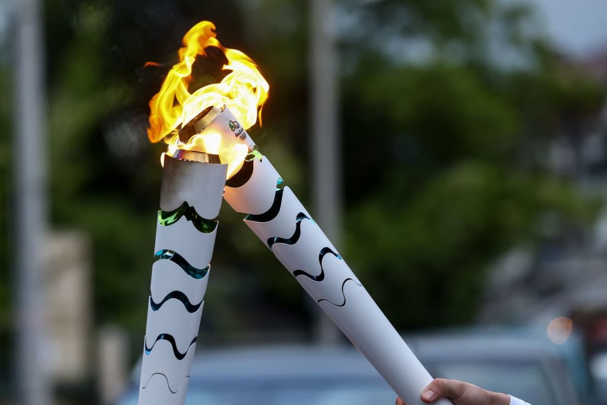 Olympic torch handover. Olympic torch handover.