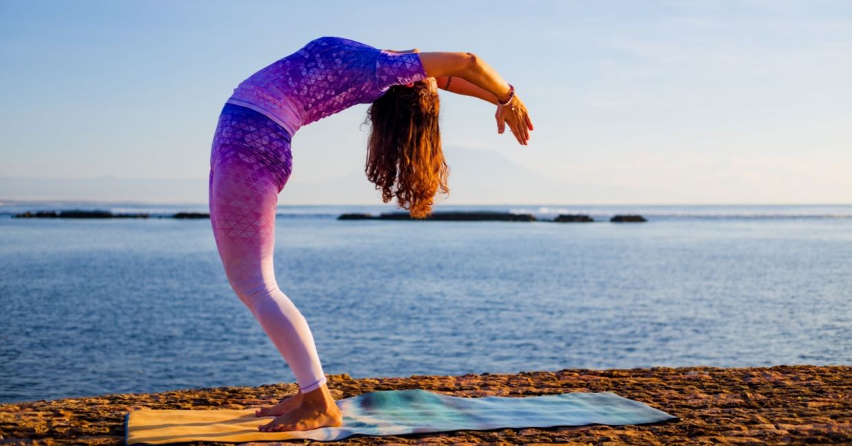 entering the raised arms yoga pose. entering the raised arms yoga pose.