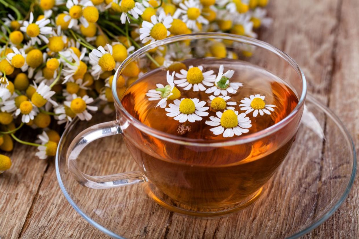 Brew chamomile tea to help heal a sunburn. Brew chamomile tea to help heal a sunburn.