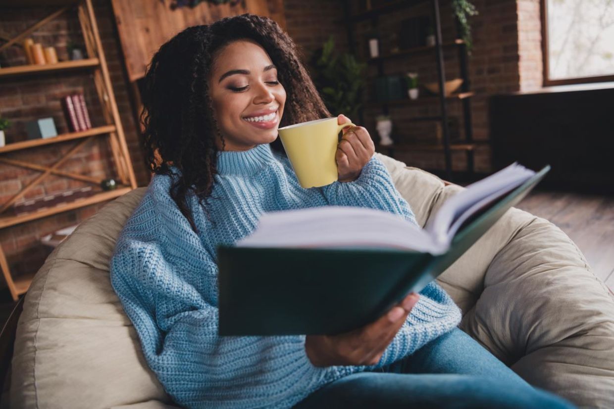 Staying warm and enjoying a good book.