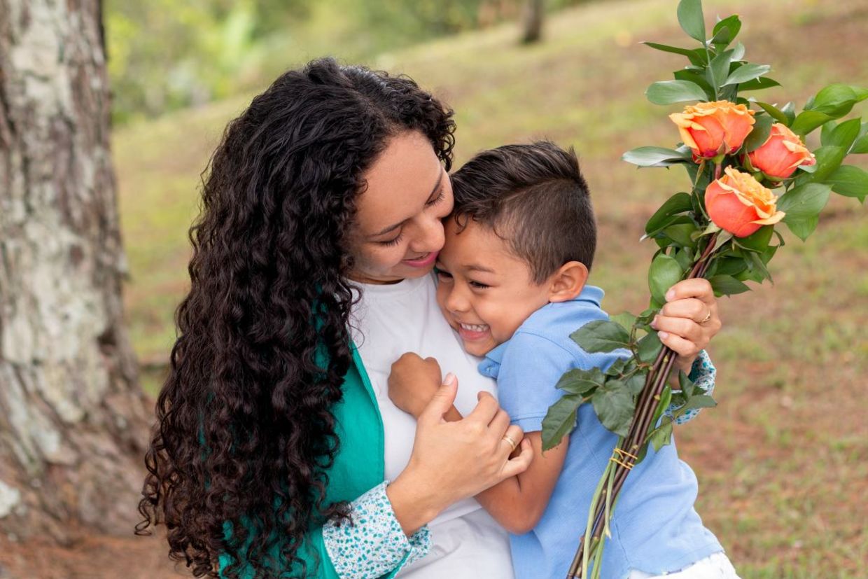 Giving mom roses on Mother’s Day. Giving mom roses on Mother’s Day.