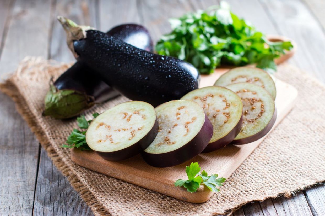 Slicing an aubergine.