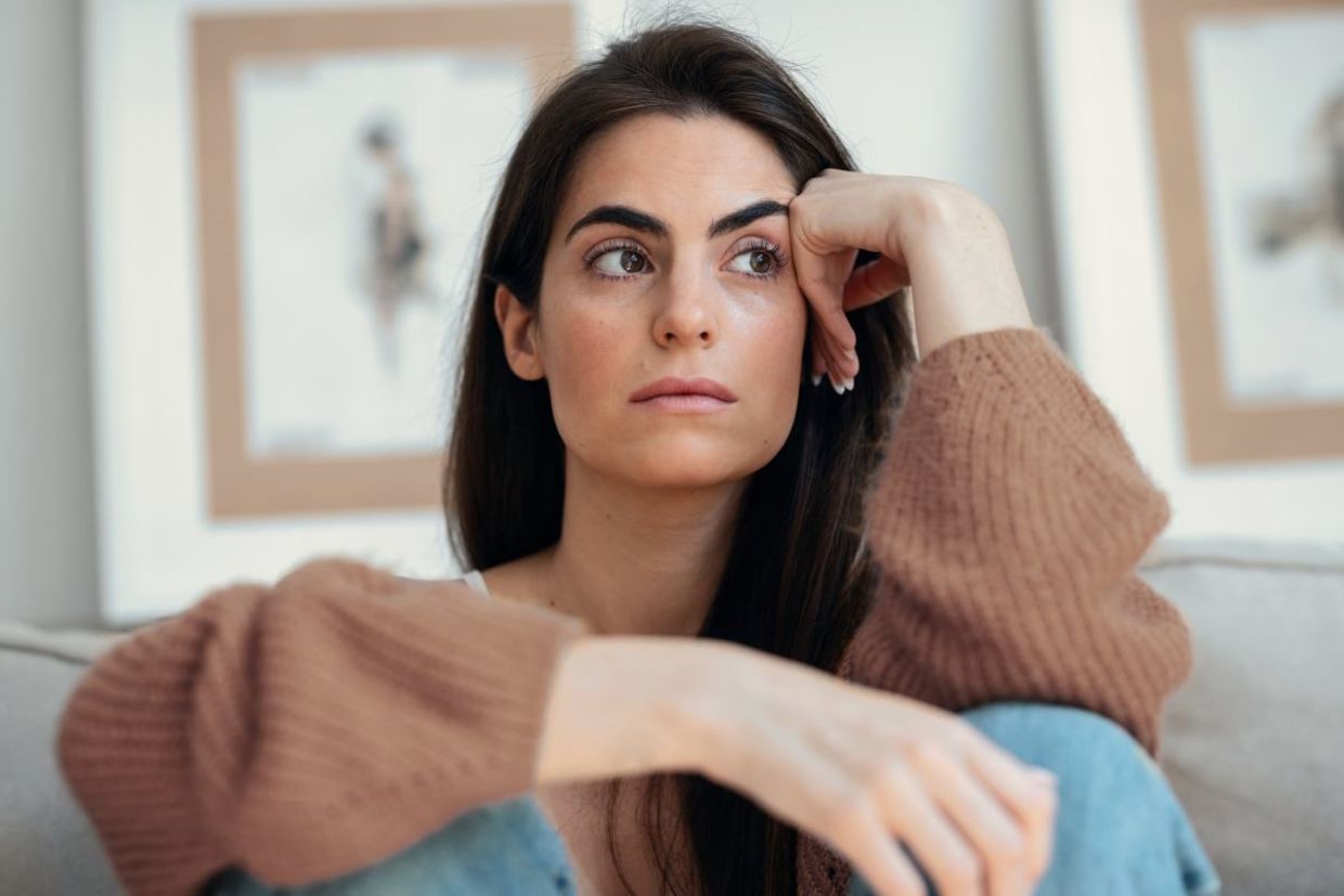 Woman lost in thought.