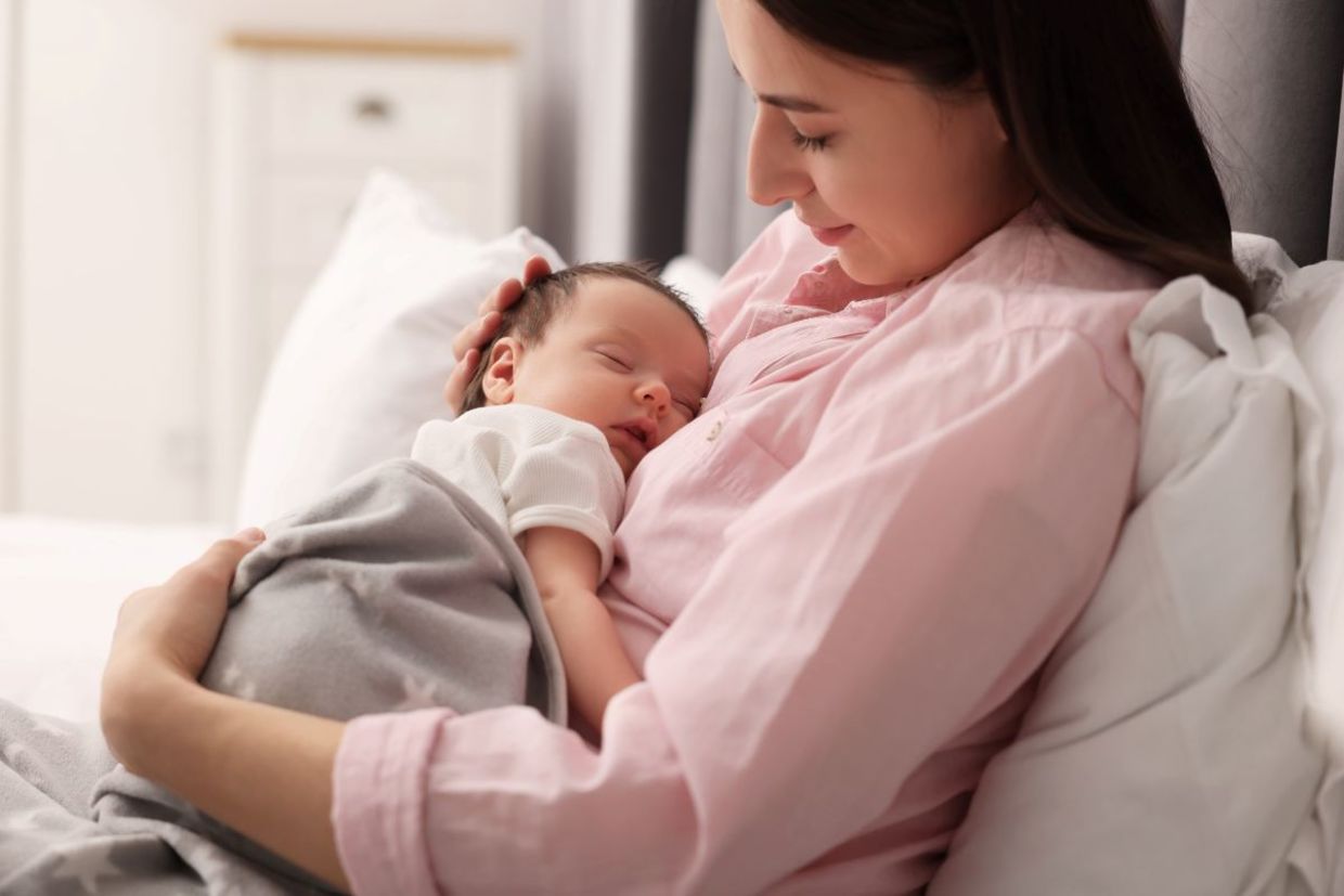 A mother and her newborn.