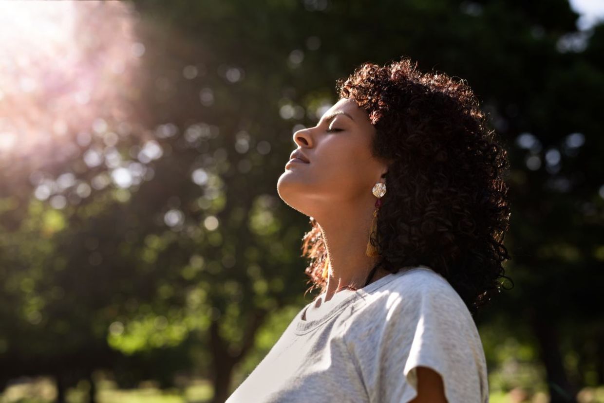 Woman doing a mindful reset.